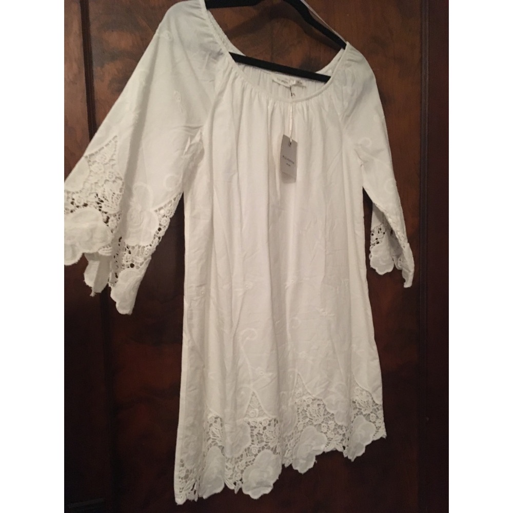 Embroidered Bell Sleeve Dress in white 🌸